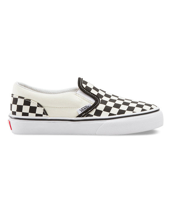 Kids white best sale vans slip ons
